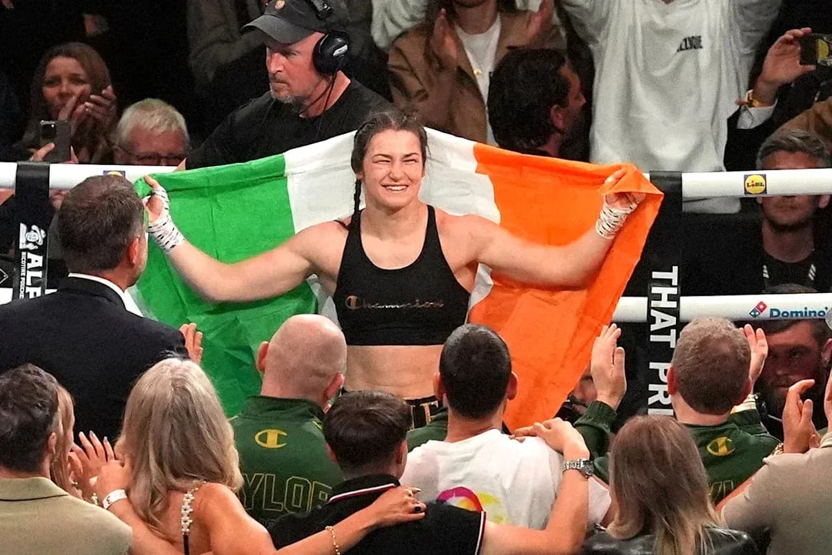 Athlete celebrating with Irish flag after match Athlete celebrating with Irish flag after match