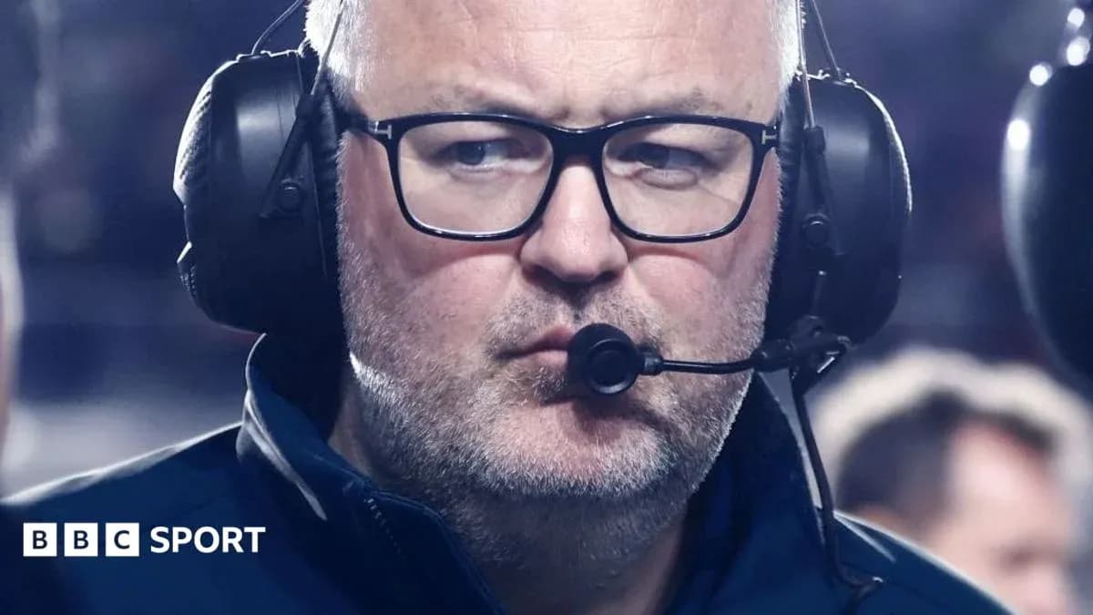 Coach wearing headset during match observation Coach wearing headset during match observation