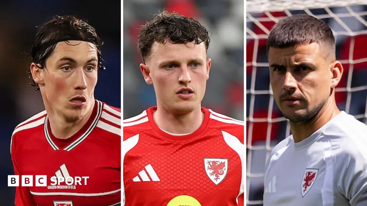Three Welsh football players posing for photo Three Welsh football players posing for photo