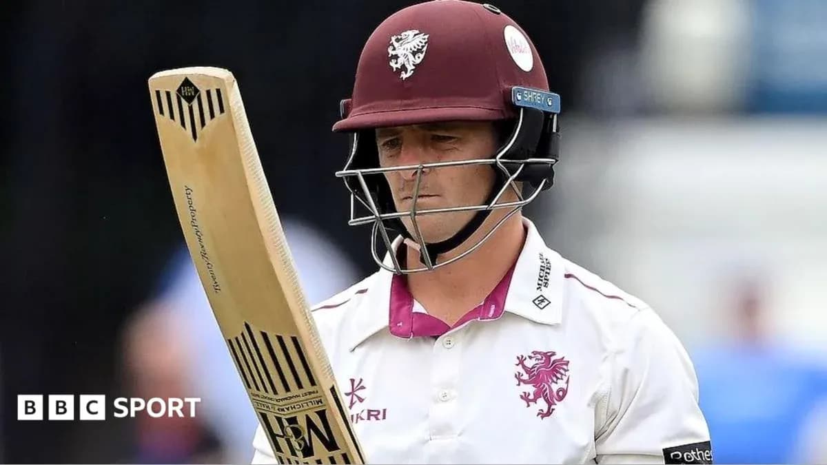 Cricketer from Somerset preparing to bat Cricketer from Somerset preparing to bat