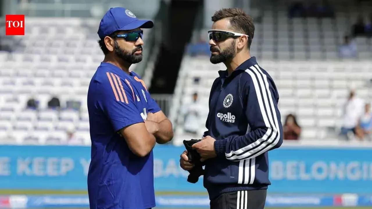 Rohit Sharma and Virat Kohli talking during practice Rohit Sharma and Virat Kohli talking during practice