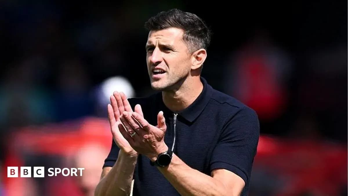 Coach gesturing and applauding during match Coach gesturing and applauding during match