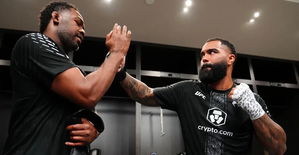 Two fighters exchanging high-fives in locker room Two fighters exchanging high-fives in locker room