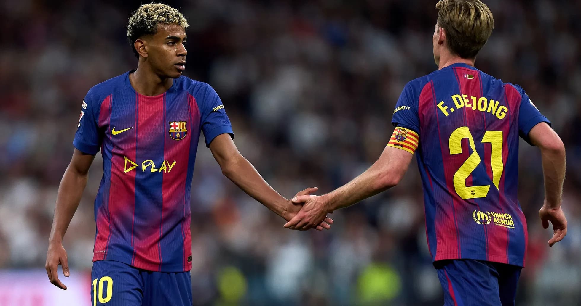 Barcelona players exchanging handshake during match Barcelona players exchanging handshake during match