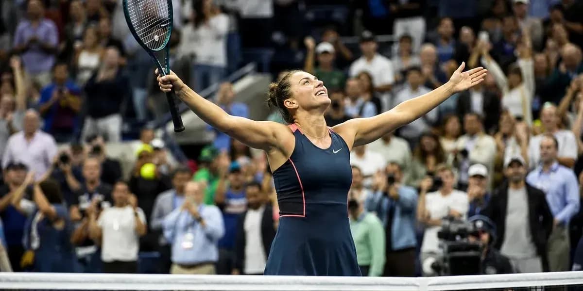 Tennis player celebrating victory with raised arms Tennis player celebrating victory with raised arms