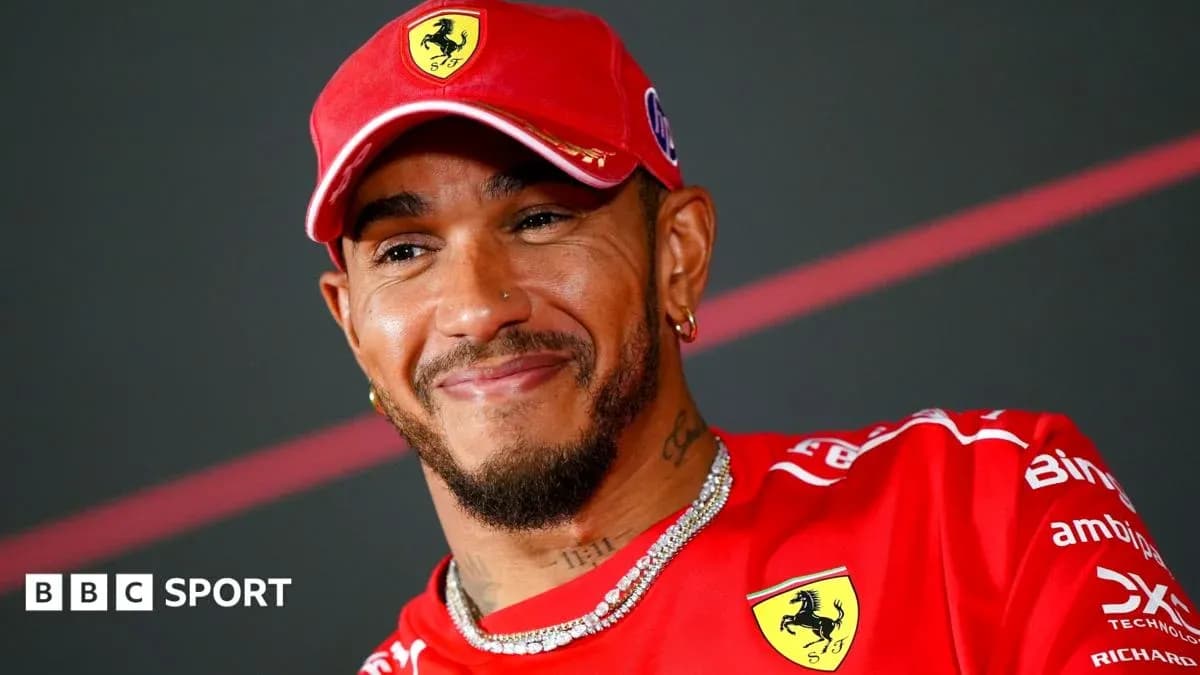 Driver wearing Ferrari cap during press conference Driver wearing Ferrari cap during press conference