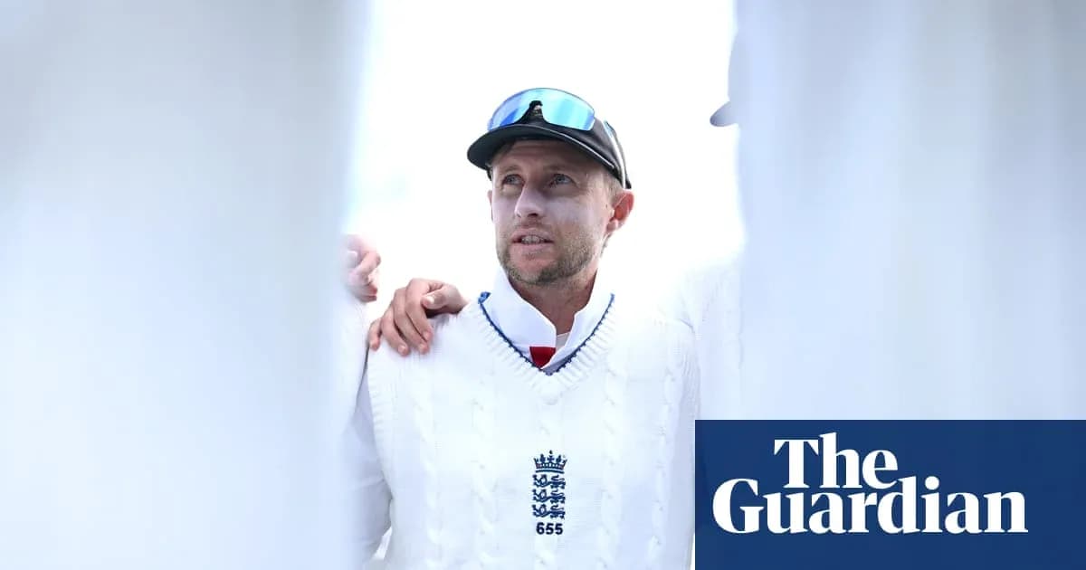 Cricketer wearing white sweater during team huddle Cricketer wearing white sweater during team huddle