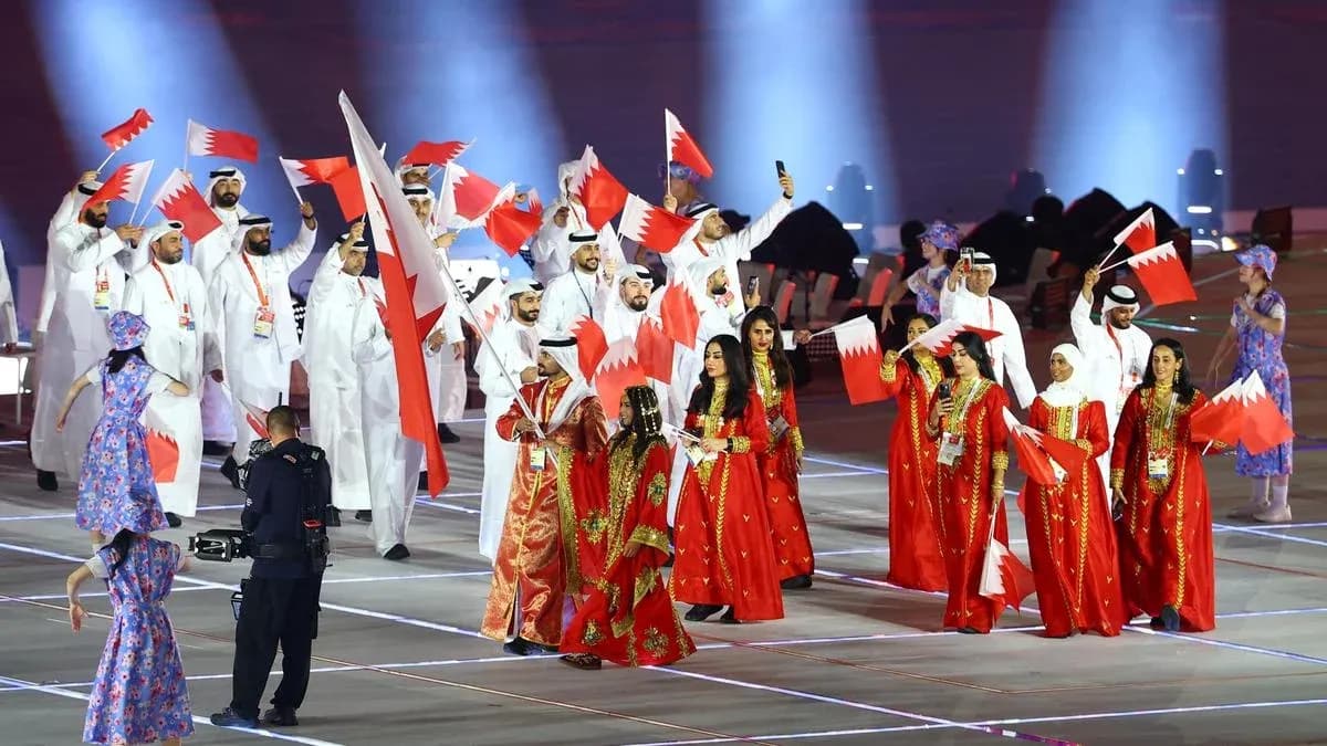 Bahrain team celebrating with flags at event Bahrain team celebrating with flags at event