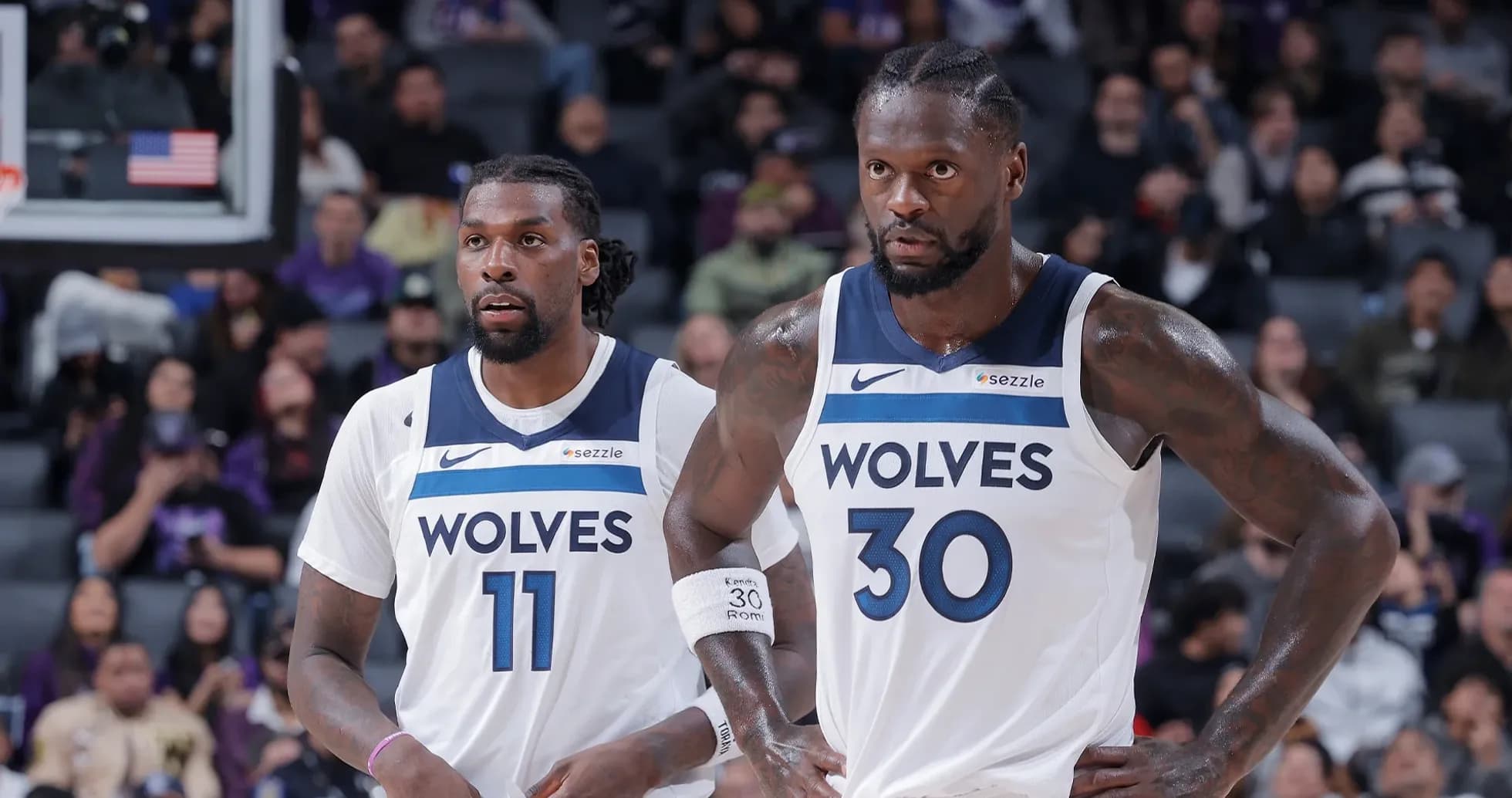 Two players from Minnesota Timberwolves on court Two players from Minnesota Timberwolves on court