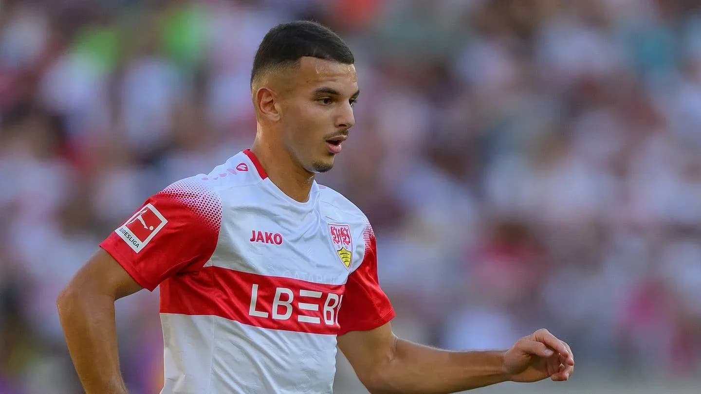 Player in Stuttgart kit during match action Player in Stuttgart kit during match action