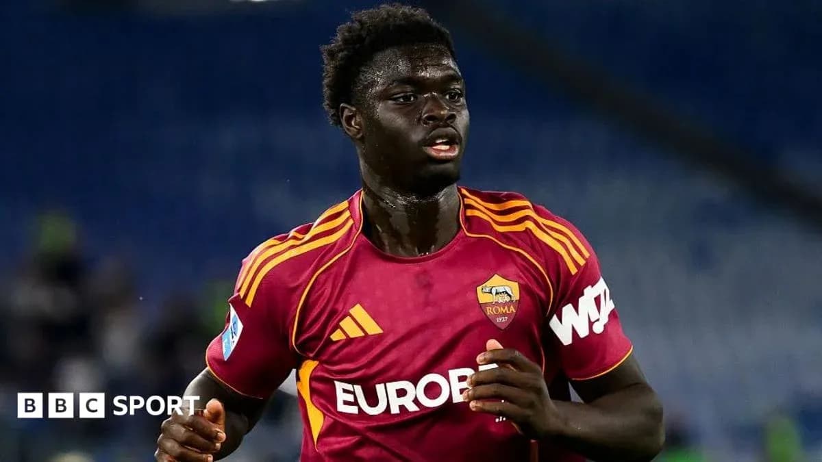 Player running in AS Roma jersey during match Player running in AS Roma jersey during match