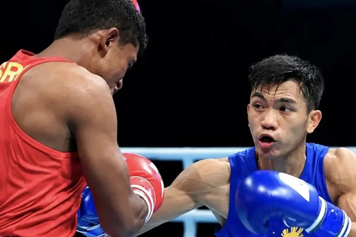 Two boxers competing in a ring during match Two boxers competing in a ring during match