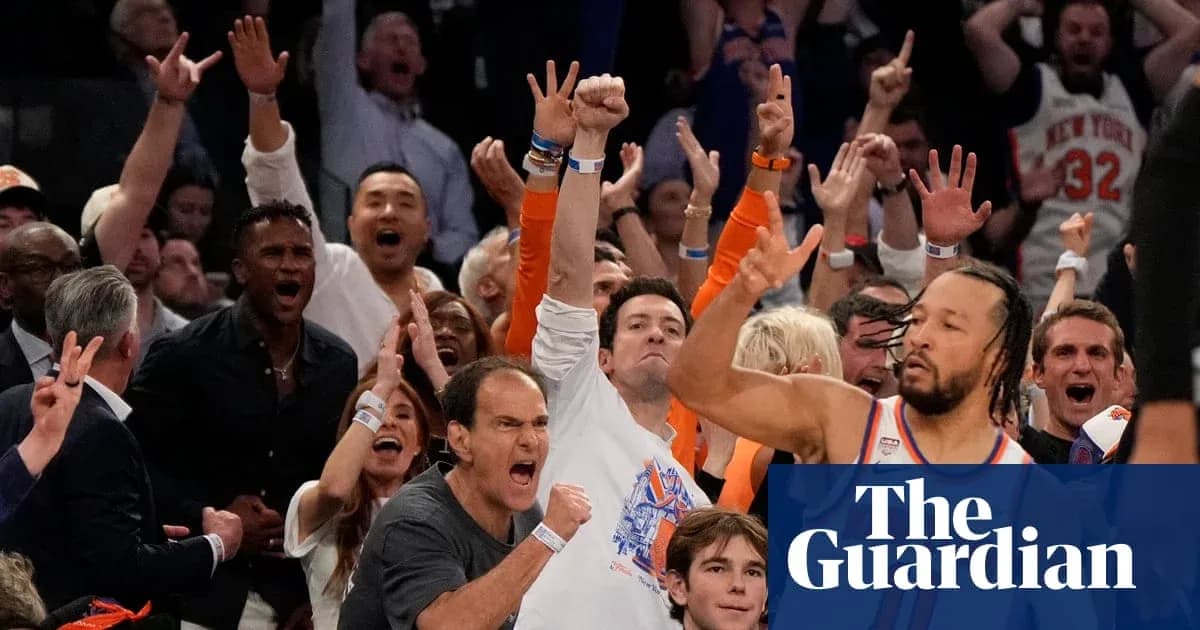 Excited crowd cheering during basketball game Excited crowd cheering during basketball game