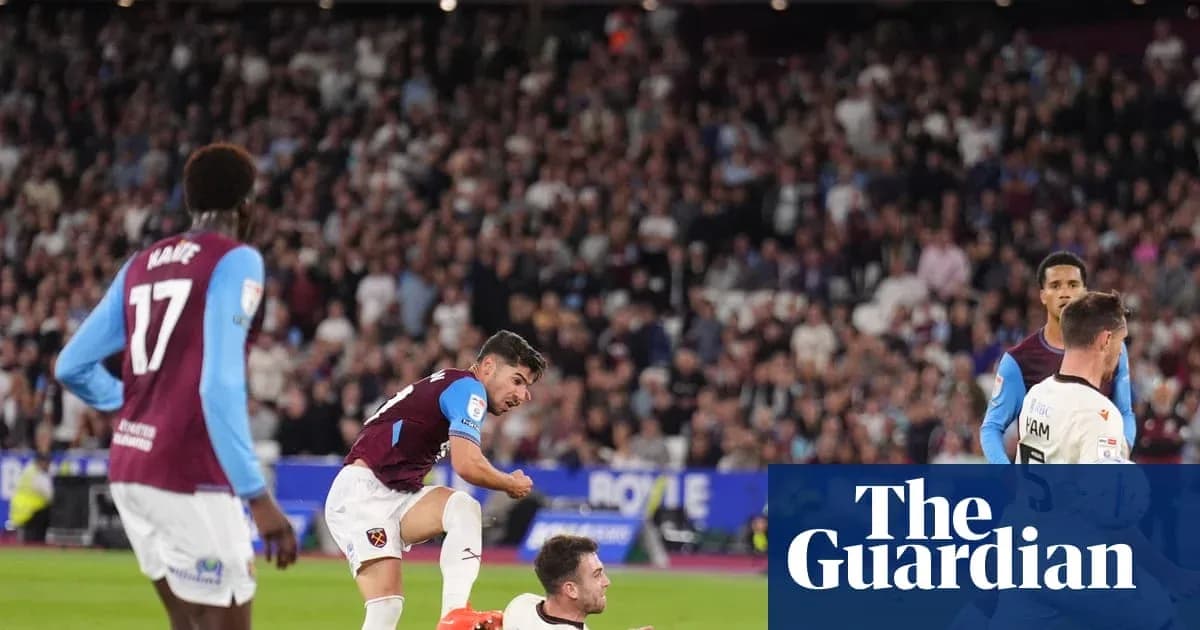 West Ham players celebrating a goal in stadium West Ham players celebrating a goal in stadium