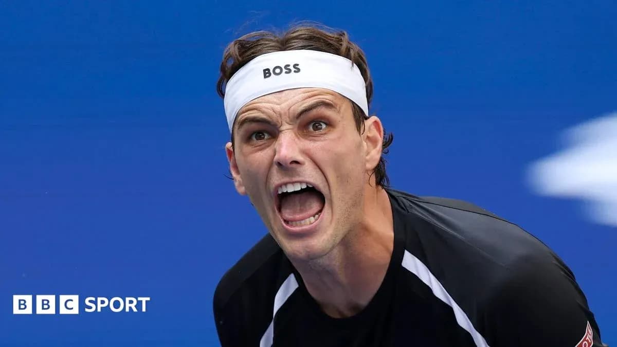 Tennis player celebrating during a match Tennis player celebrating during a match