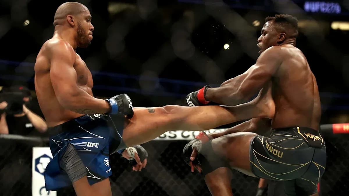 Two fighters exchanging kicks in UFC match Two fighters exchanging kicks in UFC match