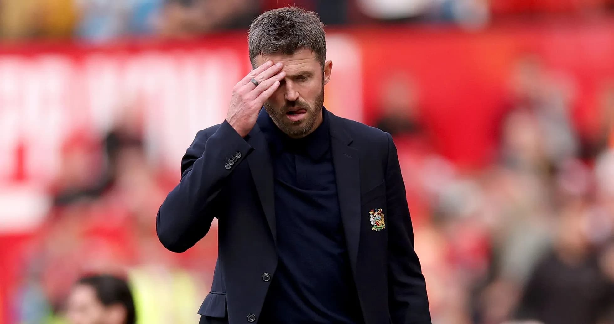 Manager walking on the pitch during match Manager walking on the pitch during match