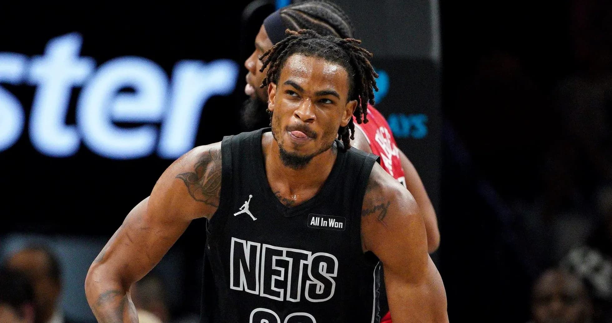 Player celebrating during a basketball game Player celebrating during a basketball game
