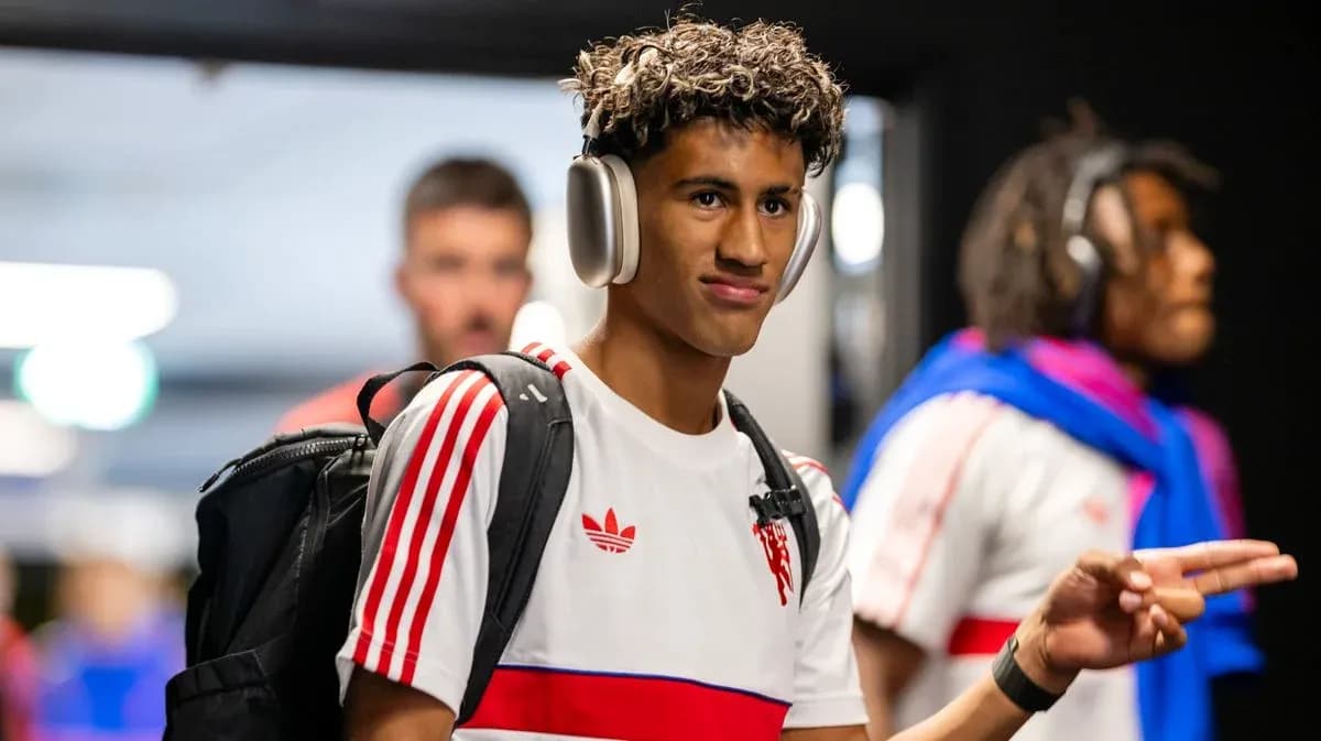 Player wearing headphones entering locker room Player wearing headphones entering locker room
