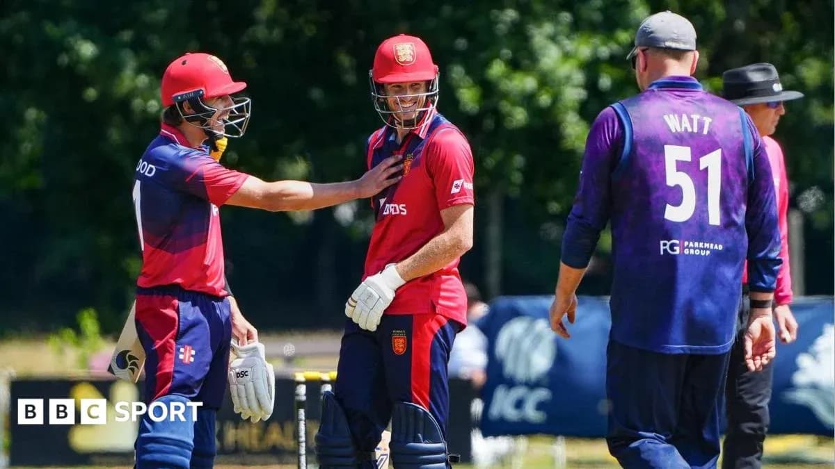 Players discussing during a cricket match on field Players discussing during a cricket match on field