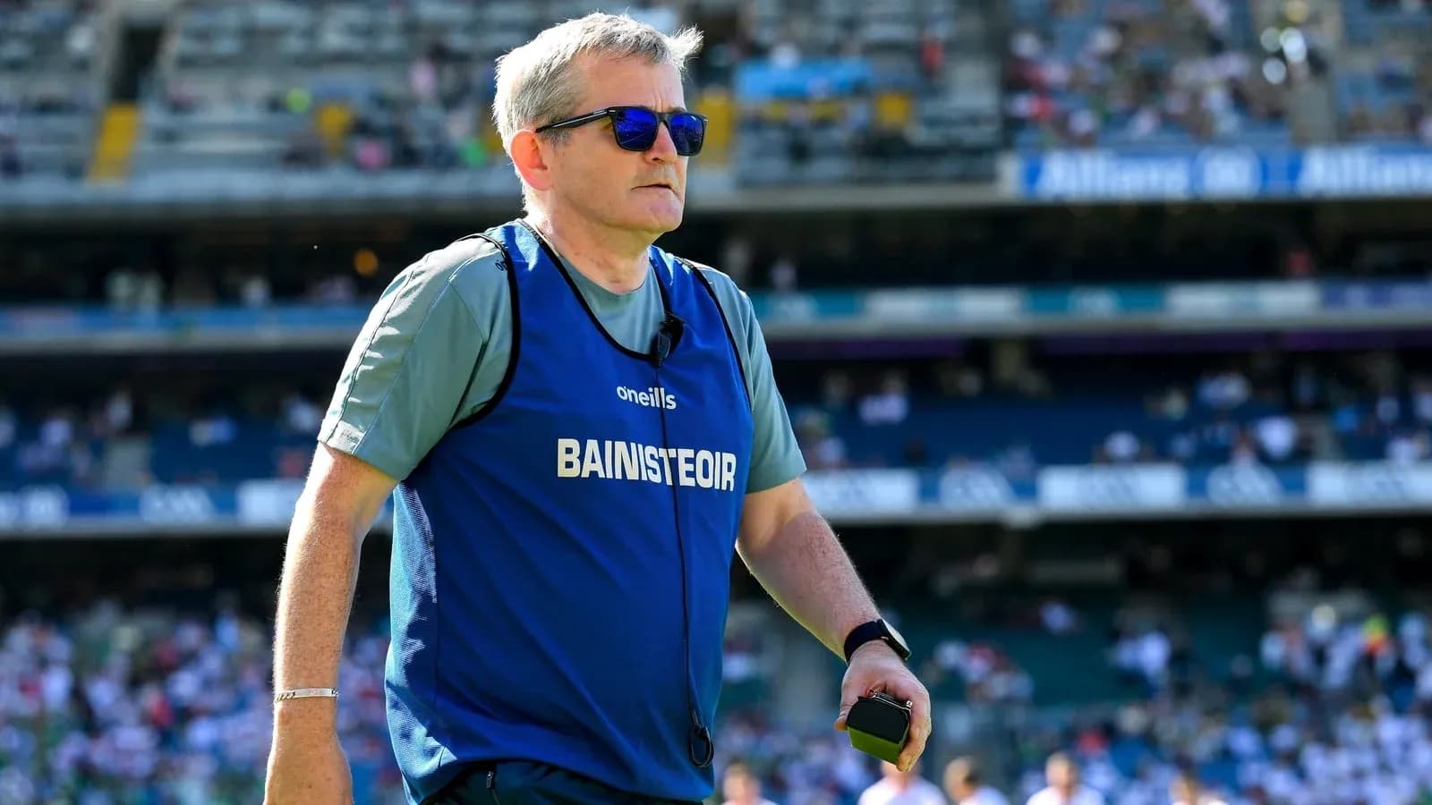 Coach wearing sunglasses on the sidelines Coach wearing sunglasses on the sidelines