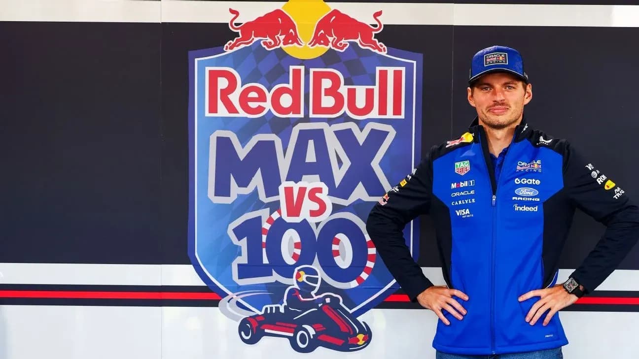 Driver posing in front of Red Bull promotional backdrop Driver posing in front of Red Bull promotional backdrop