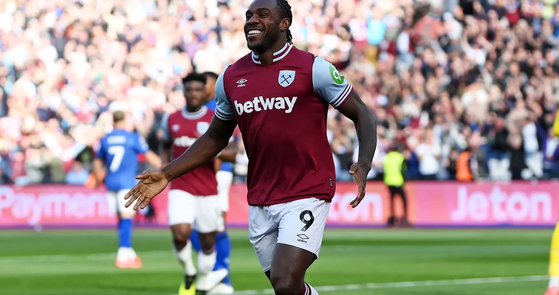 Player celebrating a goal at the stadium Player celebrating a goal at the stadium