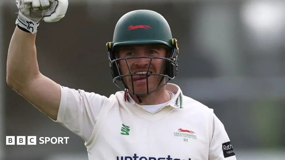 Cricketer celebrating after scoring runs on field Cricketer celebrating after scoring runs on field