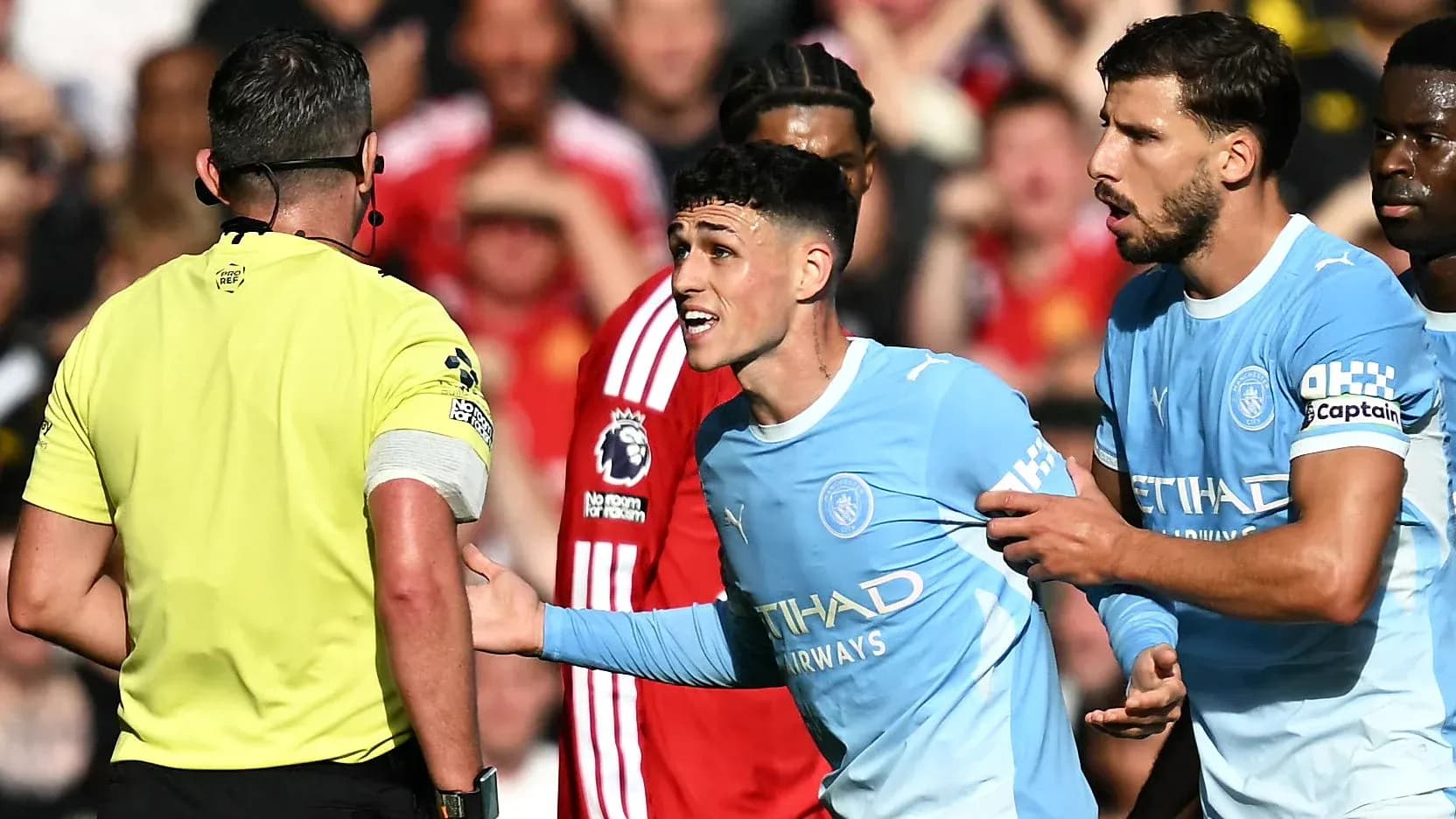 Players arguing with referee during match action Players arguing with referee during match action
