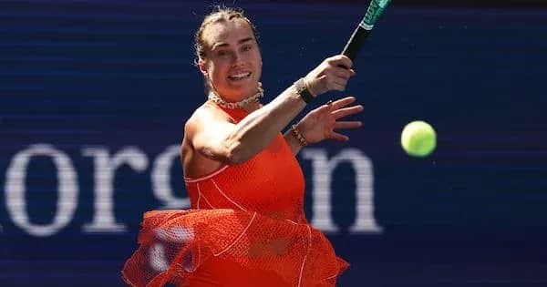 Player hitting a forehand during tennis match Player hitting a forehand during tennis match