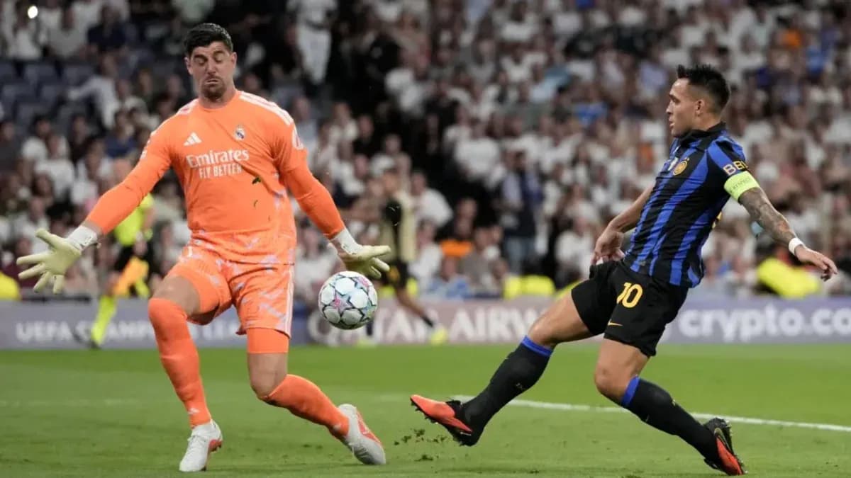 Goalkeeper attempting to save shot during match Goalkeeper attempting to save shot during match