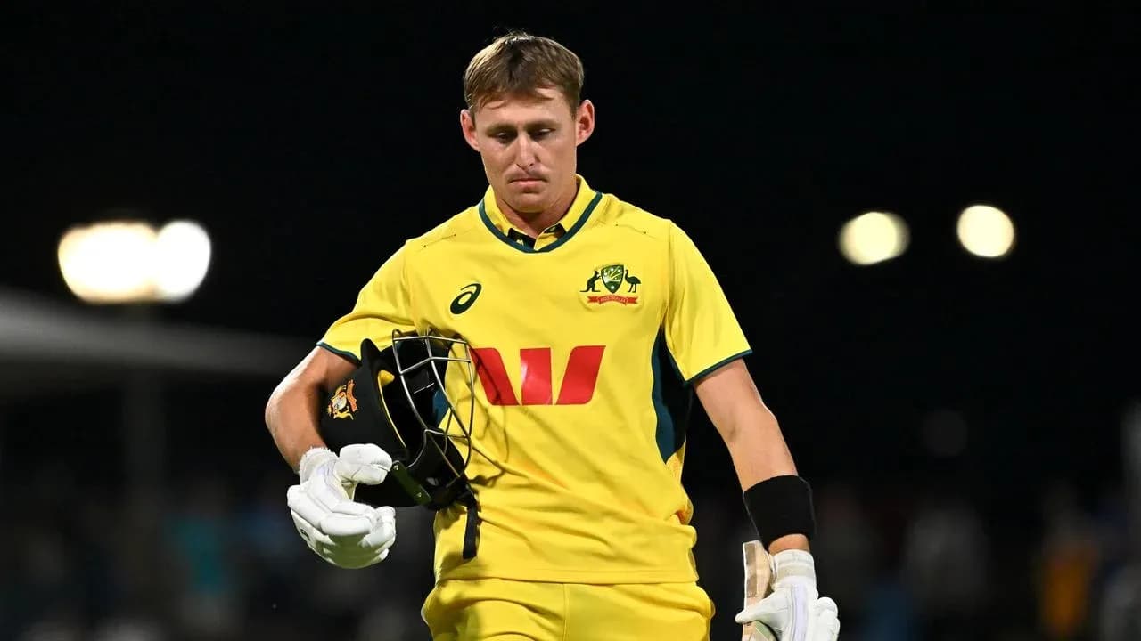 Australian cricketer leaving the field after dismissal Australian cricketer leaving the field after dismissal