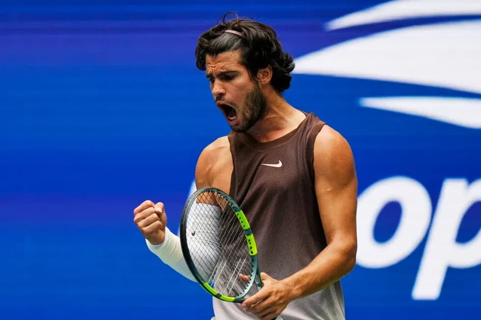Tennis player celebrating during a match Tennis player celebrating during a match