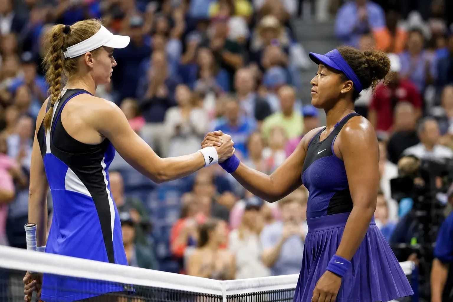 Players shaking hands at the end of match Players shaking hands at the end of match