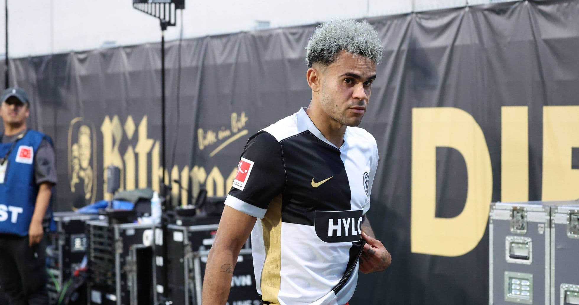 Player walking off the pitch during a match Player walking off the pitch during a match
