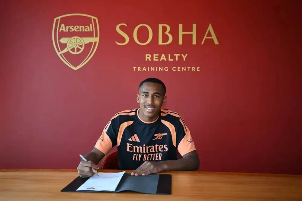 Player signing contract at Arsenal training centre Player signing contract at Arsenal training centre