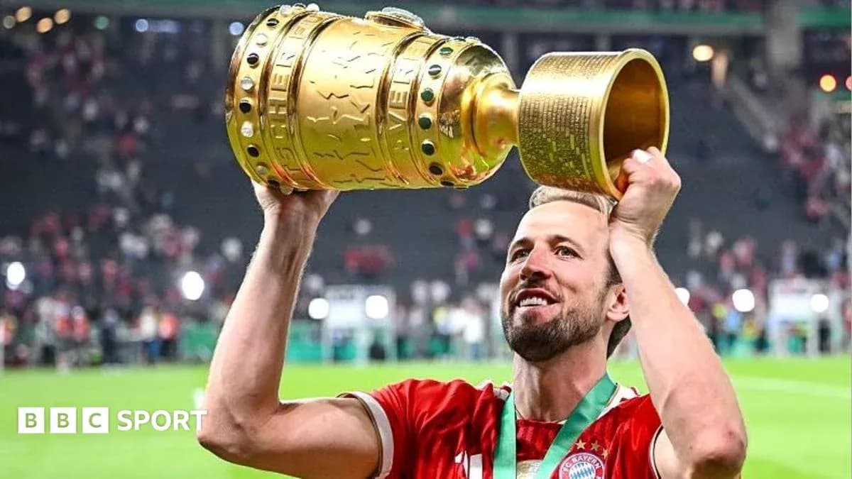 Player lifting trophy after winning the match Player lifting trophy after winning the match