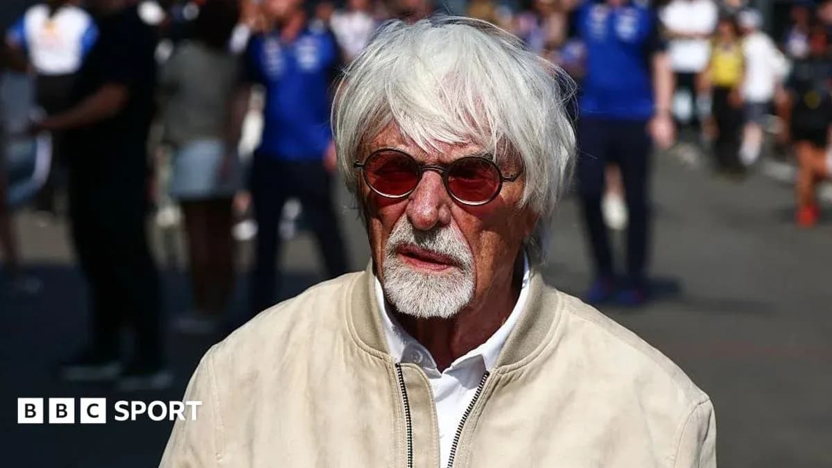 Man with white hair and sunglasses at event Man with white hair and sunglasses at event