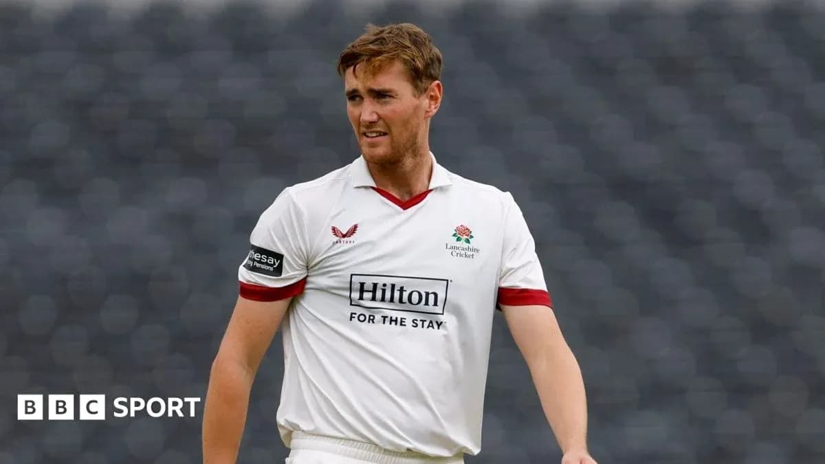 Cricketer in Lancashire Cricket uniform on field Cricketer in Lancashire Cricket uniform on field